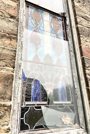An opening with the stained glass removed